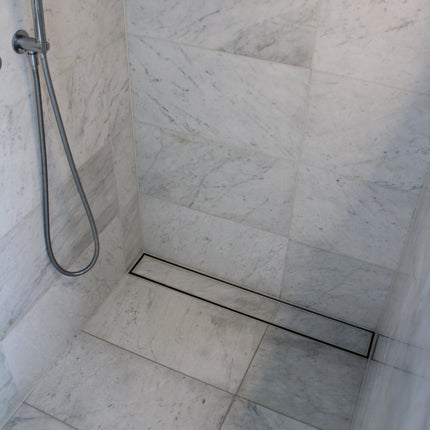 600mm SS Tile Insert Shower Drain – 100mm x 30mm, End 50mm Outlet