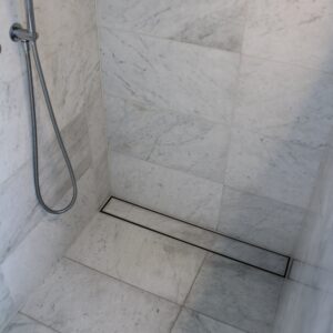 SS Tile Insert Shower Drain – 600mm (100 x 30mm, End 50mm Outlet)